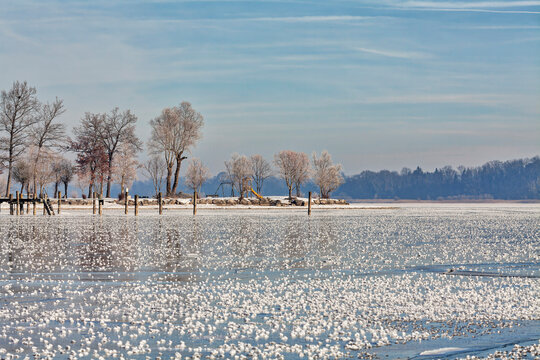 Scenic view of frozen lake during winter - Powered by Adobe
