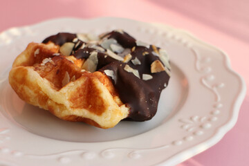 Round Chocolate Waffle on a white ceramic plate