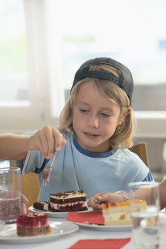 Boy Eating Cake at home