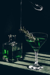 Stylized bottle of absinthe. Background, mockup.