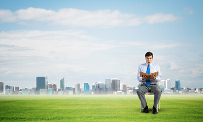 young businessman with book