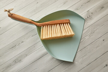Sweeping Dust With A Broom On A Dustpan, Housekeeping Concept