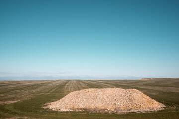 Pile of stones in a cultivated field