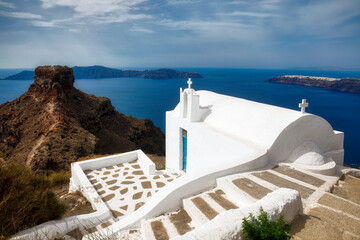 Small Chapel on the Walking Path to Skaros Rock at Imerovigli, with a Distant View of Oia,...