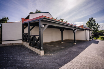 Residential car port. Yard of a house