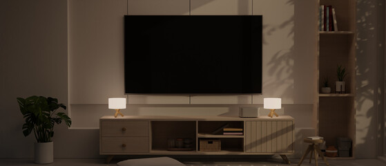 Contemporary and comfortable living room at night interior design with large TV screen on the wall