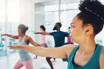 Yoga, exercise class and fitness people in warrior or stretching for health and wellness. Diversity men and women group together for workout, training or pilates for healthy lifestyle motivation