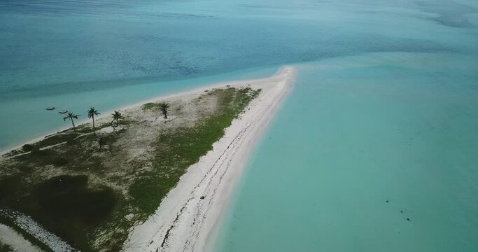 Drone shot of island amidst sea in Maldives