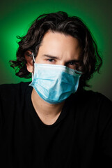 Handsome guy portrait with a mask