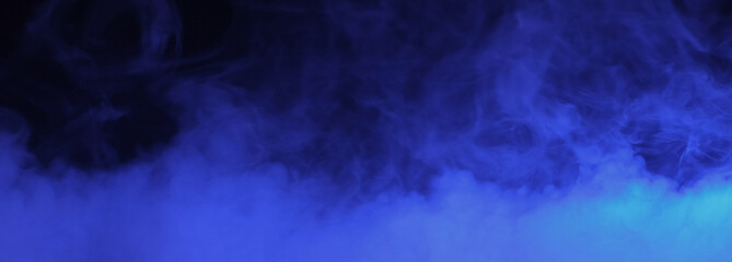 Fototapeta na wymiar blue smoke on black