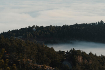 Thick clouds layer with hills in foreground