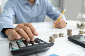 Fototapeta premium Accountant or banker calculate the cash bill.