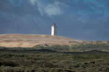 Fototapeta na wymiar Remote Rubjerg Knude Fyr Lighthouse On A Sand Dune, Denmark