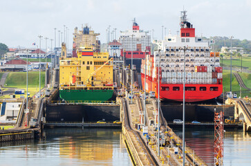 Two cargo ship transiting the Miraflores locks in the Panama Canal in Central America - 569500175