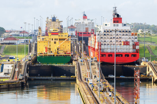 Two cargo ship transiting the Miraflores locks in the Panama Canal in Central America