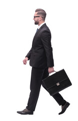 side view . businessman with leather briefcase stepping forward.