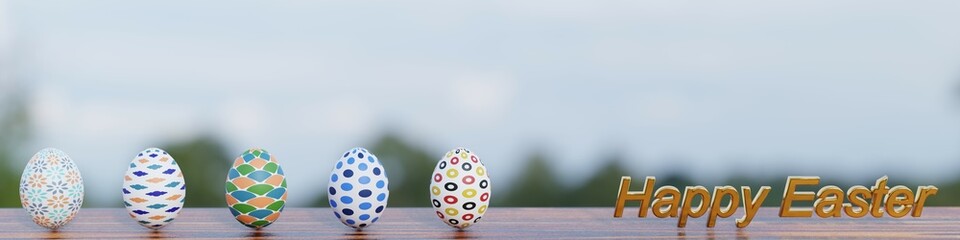 beautifully patterned easter eggs on wooden board with wild landscape in the back