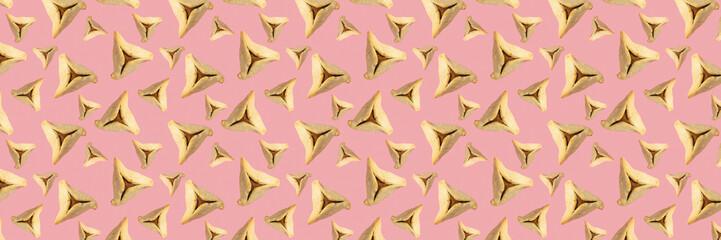 Seamless pattern with Purim cookie Hamantaschen on pink background. Purim banner.