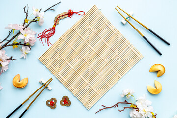 Japanese New Year tabble place setting mock up. Mat napkin and chopsticks