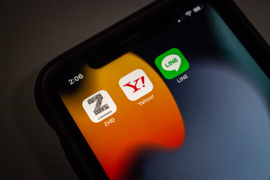 Vancouver, CANADA - Feb 6 2023 : Z Holdings, Yahoo! Japan and LINE app icons seen in an iPhone. In 2023 Feb, Z Holdings announced that will merger with its two owned subsidiaries, Yahoo Japan and LINE