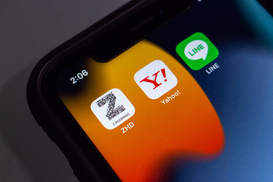 Vancouver, CANADA - Feb 6 2023 : Z Holdings, Yahoo! Japan and LINE app icons seen in an iPhone. In 2023 Feb, Z Holdings announced that will merger with its two owned subsidiaries, Yahoo Japan and LINE