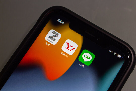 Vancouver, CANADA - Feb 6 2023 : Z Holdings, Yahoo! Japan and LINE app icons seen in an iPhone. In 2023 Feb, Z Holdings announced that will merger with its two owned subsidiaries, Yahoo Japan and LINE