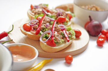 Sandwich with tuna and vegetables on the table, food concept