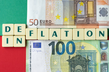 Inflation or Deflation The blocks form the choice words Inflation or Deflation. One dollar bills. Concept of Inflation or Deflation in the EU.