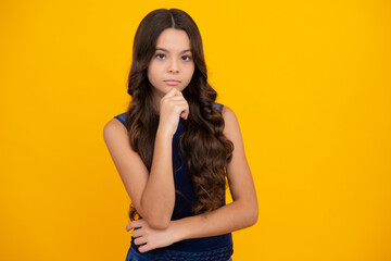 Obraz premium Cute young teenager girl against a isolated background. Studio portrait of pretty beautiful child.