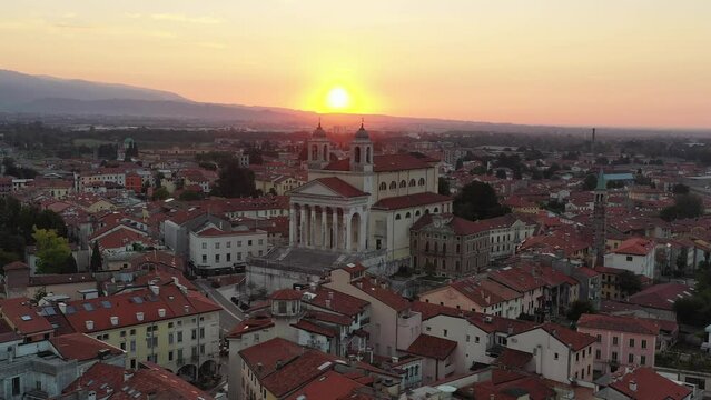 Duomo of Schio aerial view with drone at sunrise