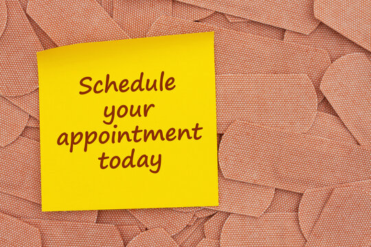Schedule your appointment today on sticky note with lots of fabric adhesive band aids