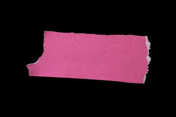 Torn paper piece isolated on black background