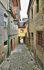 Obraz na płótnie Canvas Old street in the heart of the tradition of tanning and beating hides in Guimaraes, Portugal