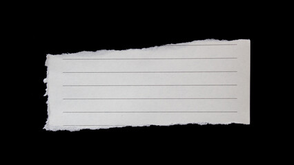 Torn paper piece isolated on black background