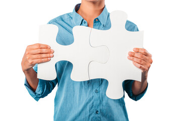 woman joins two puzzle pieces. concept teamwork, partnership, integration