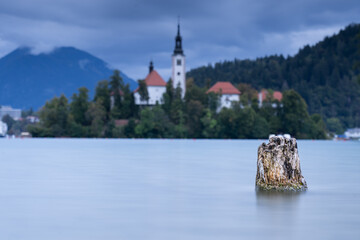 Fototapeta na wymiar lake bled Slovenia Europe island church water cloudy scenic nature mountains