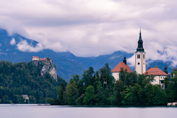 Fototapeta premium lake bled Slovenia Europe island church water cloudy scenic nature mountains