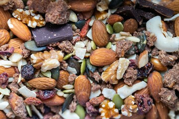 dried fruit, dates, prunes, grains, wheat, lentils, rice stored in glass jars in a kitchen