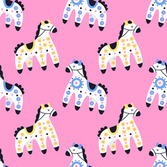 Cartoon colorful horses pattern on a pink background
