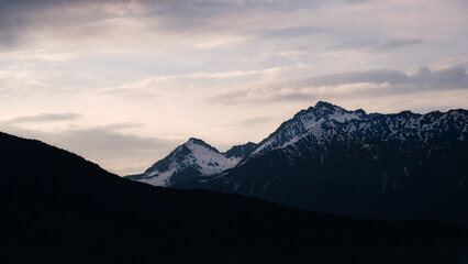 Fototapeta na wymiar Caucasus mountains at sunset in the evening