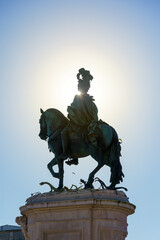 portuguese horse and rider statue against a blue sky