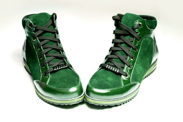 seasonal women's shoes (boots, boots) high, leather (suede) with laces, close up, on a white background