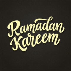 Fototapeta na wymiar Ramadan kareem. Hand lettering text on dark background. Vector typography for posters, banners, cards