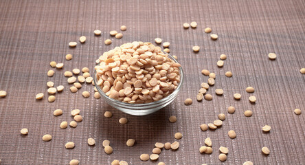 Arhar or Toor dal or Split Pigeon Pea or Yellow lentils or Pulses, top view, India