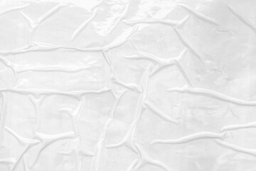 white crumpled and creased plastic poster texture background