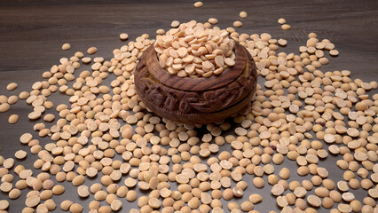 Arhar or Toor dal or Split Pigeon Pea or Yellow lentils or Pulses, top view, India