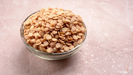 Arhar or Toor dal or Split Pigeon Pea or Yellow lentils or Pulses, top view, India