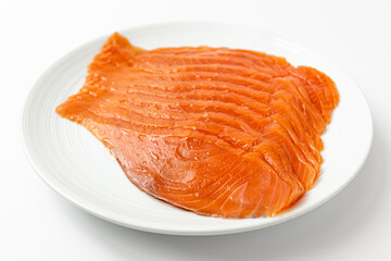 smoked salmon on a white background