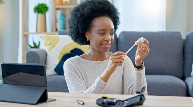 Woman With Syringe Preparing An Insulin Injection At Home With An Online Tutorial. One Girl Injecting Self With Medicine Treatment To Treat Chronic Illnesses Type 1 2 Diabetes, High Blood Or Glycemia