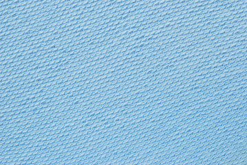 Blue color cotton boucle fabric texture as background
